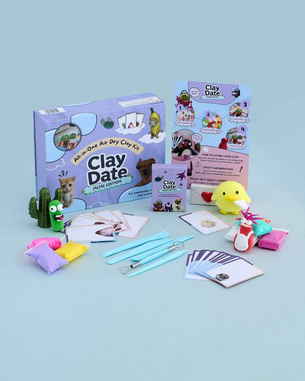 Clay Date™ Meme Kit box with clay colors, sculpting tools and meme-themed inspiration cards on a pastel background