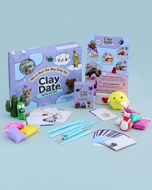 Clay Date™ Meme Kit box with clay colors, sculpting tools and meme-themed inspiration cards on a pastel background