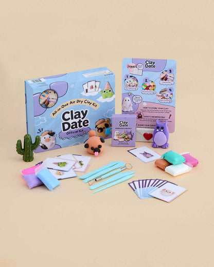 Clay Date™ New Official Kit box with 36 clay colors, sculpting tools and inspiration cards displayed on a pastel background