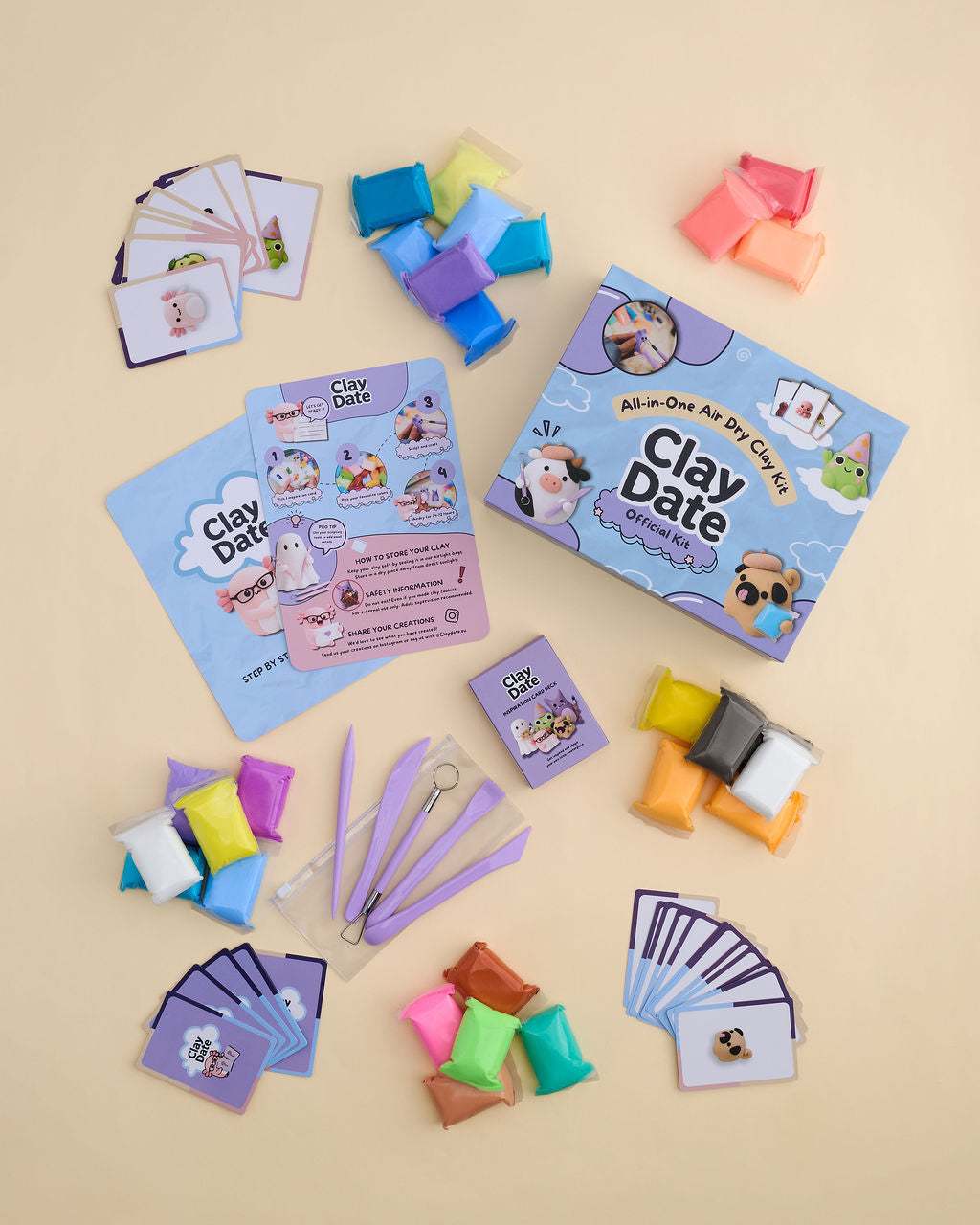 Finished clay creations and inspiration cards from the Clay Date New Official Kit arranged together