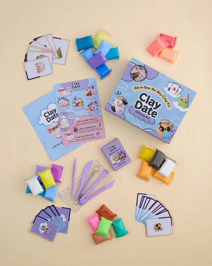 Finished clay creations and inspiration cards from the Clay Date New Official Kit arranged together