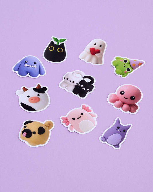 Ten Clay Date character vinyl stickers arranged on a purple background